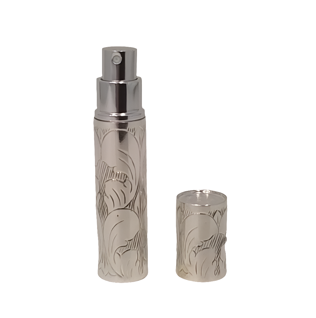 Silver spray bottle with engraved design 
